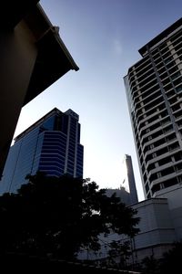 Low angle view of modern buildings against sky