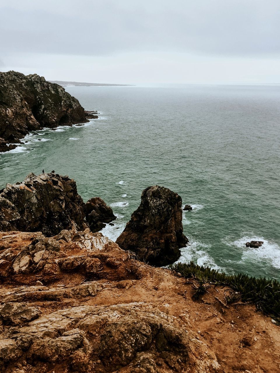 sea, water, horizon over water, horizon, sky, rock, beauty in nature, scenics - nature, rock - object, tranquil scene, tranquility, solid, no people, nature, land, rock formation, idyllic, day, beach, outdoors, rocky coastline