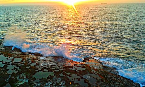 Scenic view of sea during sunset