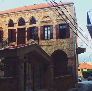 Low angle view of old building against sky