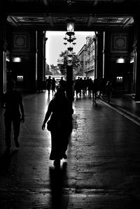 People walking on street in city