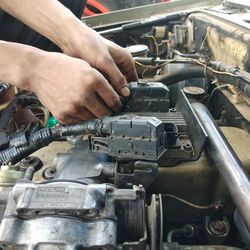 Man working in car