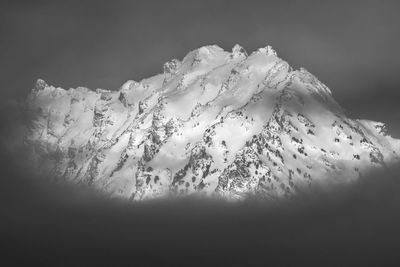 Close-up of snow over water