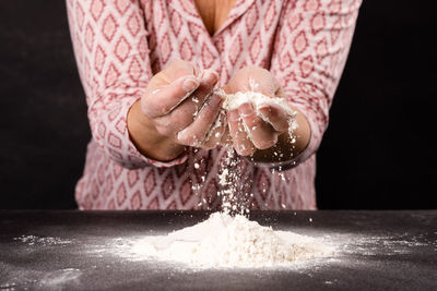 Close-up of hand holding water