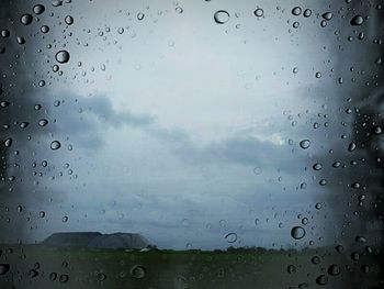 Close-up of water drops on glass