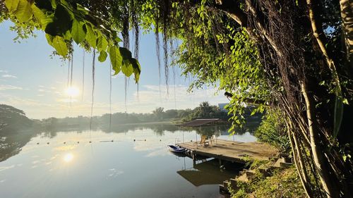 Scenic view of lake against sky during sunset