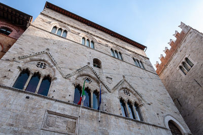 Low angle view of historic building against sky