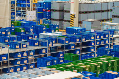 Industrial distribution, composition. storage with high shelves, cargo boxes on racks. 