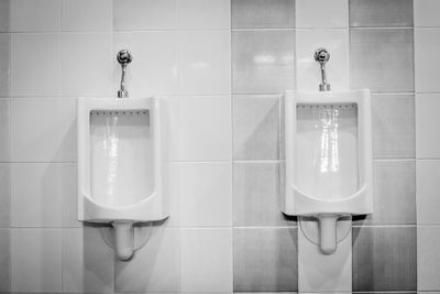 Digital composite image of faucet in bathroom