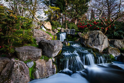 Stream flowing through rocks in abpark