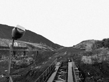 View of railroad tracks against clear sky