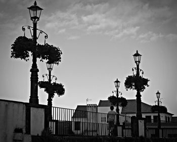 Low angle view of street light against sky