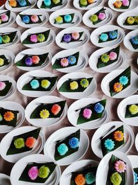 Full frame shot of colorful sweet food in plates