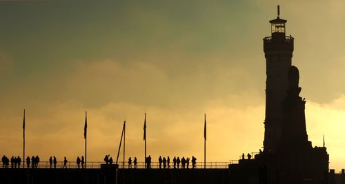 Silhouette of people at sunset