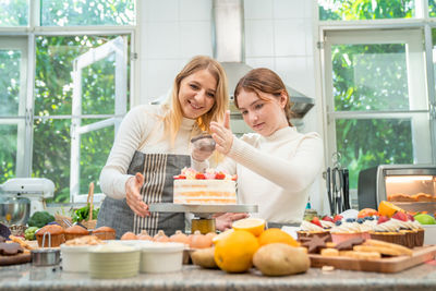 Friends and vegetables on cutting board
