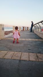 Full length of girl standing in playground