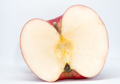 Close-up of apple against white background