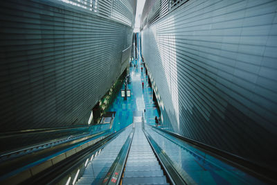 Low angle view of illuminated escalator