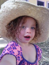 Portrait of cute girl wearing hat