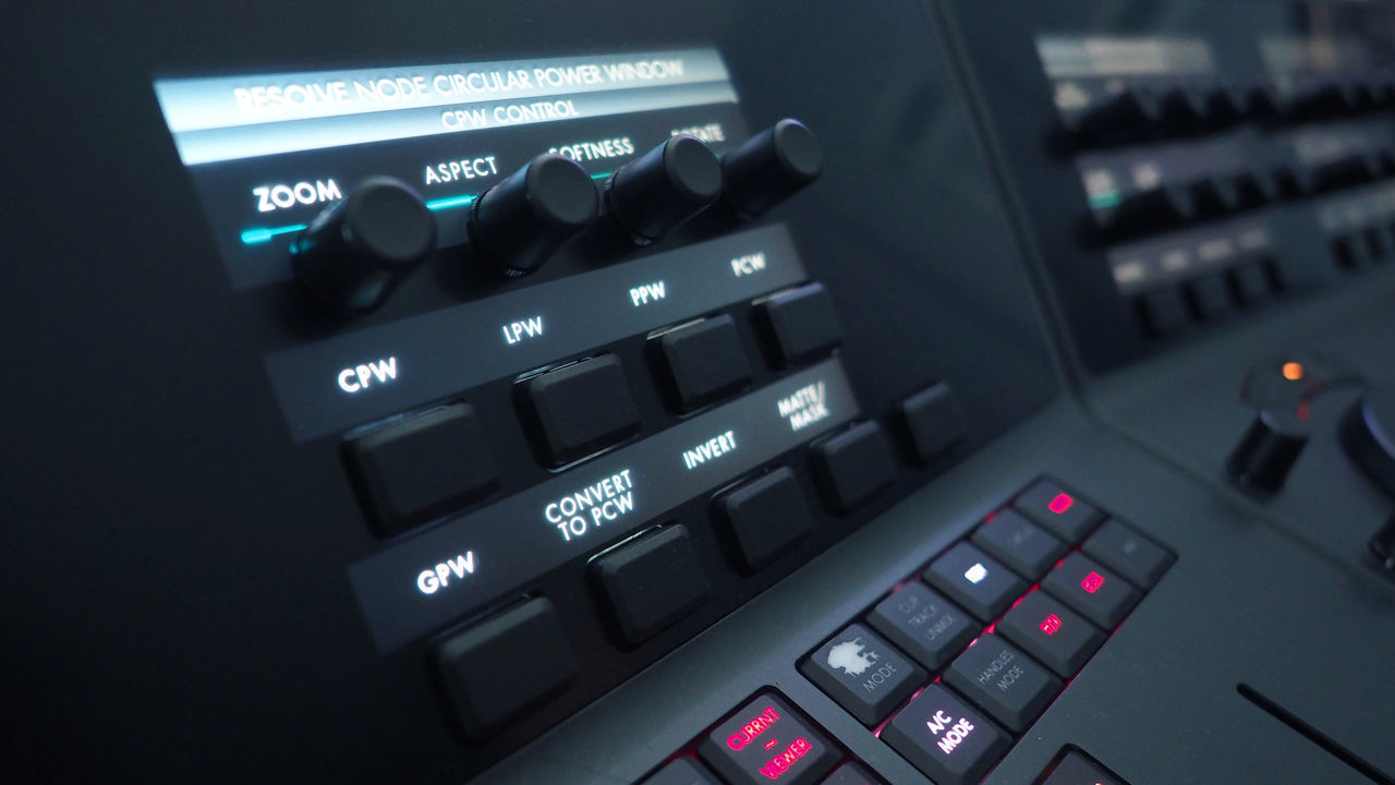 HIGH ANGLE VIEW OF COMPUTER KEYBOARD AT ILLUMINATED UNDERGROUND STATION