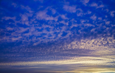 Low angle view of dramatic sky at sunset