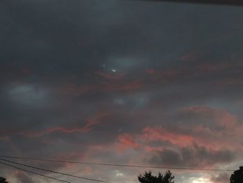 Low angle view of cloudy sky during sunset