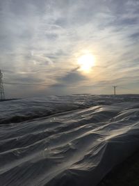 Scenic view of landscape against sky during sunset
