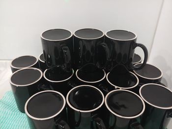 High angle view of coffee cups on table