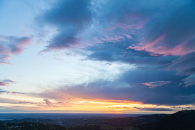 Wonderful scenic sunrise on modena plain, italy,with beautiful colorful clouds and sky