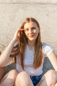 Portrait of a beautiful teenage girl smiling and looking at camera