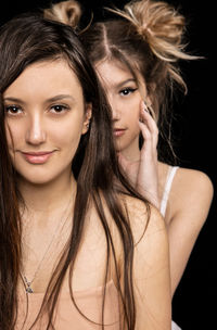 Close-up portrait of a smiling young woman