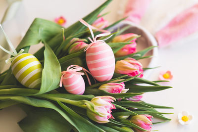Happy easter. stylish dyed easter eggs with spring flowers