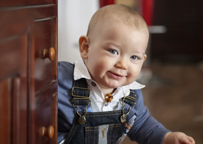 Portrait of cute baby at home