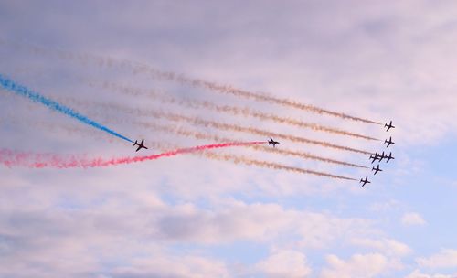 Red arrows aerobatic display team with red white and blue vapor trails