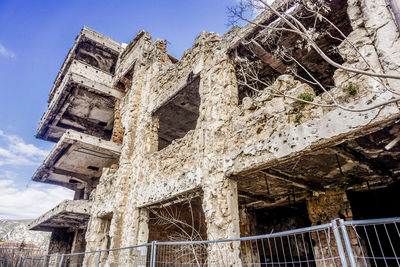 Low angle view of old building against sky