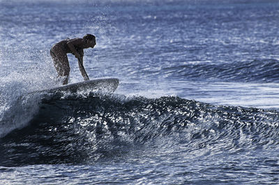 Man surfing in sea