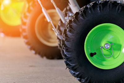 New tire with rubber tire. detail of technique close-up. copy space. snow removal equipment or lawn