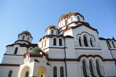 Low angle view of building against blue sky