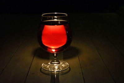 Close-up of wineglass on table