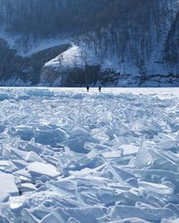 Scenic view of snowcapped mountains during winter