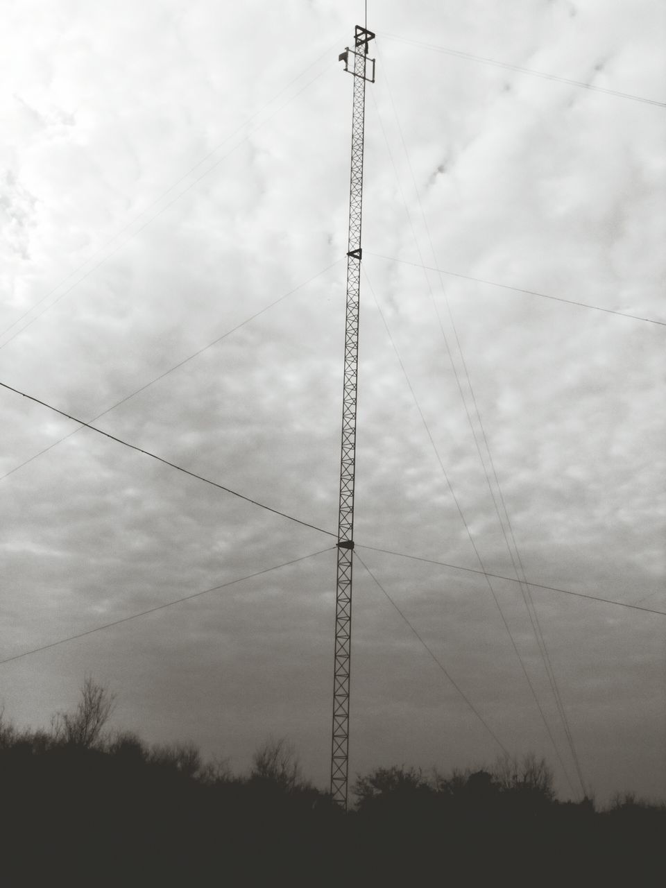 technology, connection, power line, low angle view, fuel and power generation, electricity, electricity pylon, power supply, sky, cable, tower, cloud - sky, tall - high, electricity tower, cloud, day, nature, outdoors, scenics, tall, cloudy, no people, vapor trail, cloudscape, tranquility, development, telephone line, tranquil scene, pylon