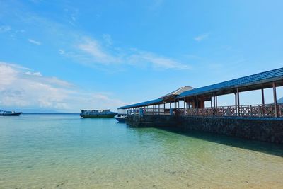 Scenic view of sea against blue sky