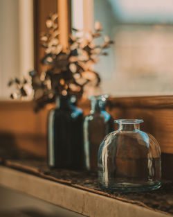 Close-up of glass jar on table at home