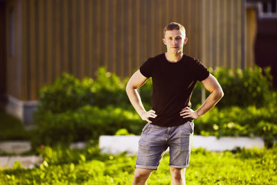 Young man standing on field