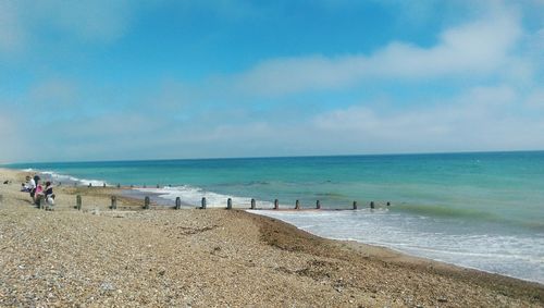 Scenic view of beach and sea at west sussex