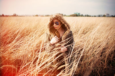 Young woman standing in farm