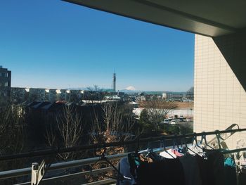 Cityscape against blue sky