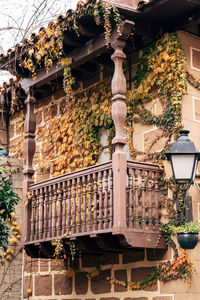 Low angle view of buildings and trees in city