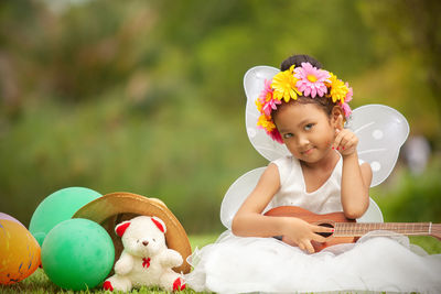 Cute girl playing with toy