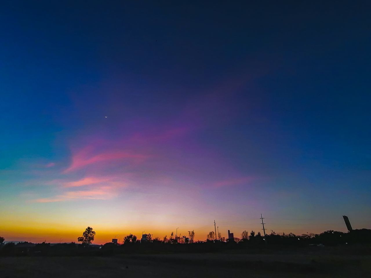 SILHOUETTE LANDSCAPE AGAINST SKY AT SUNSET